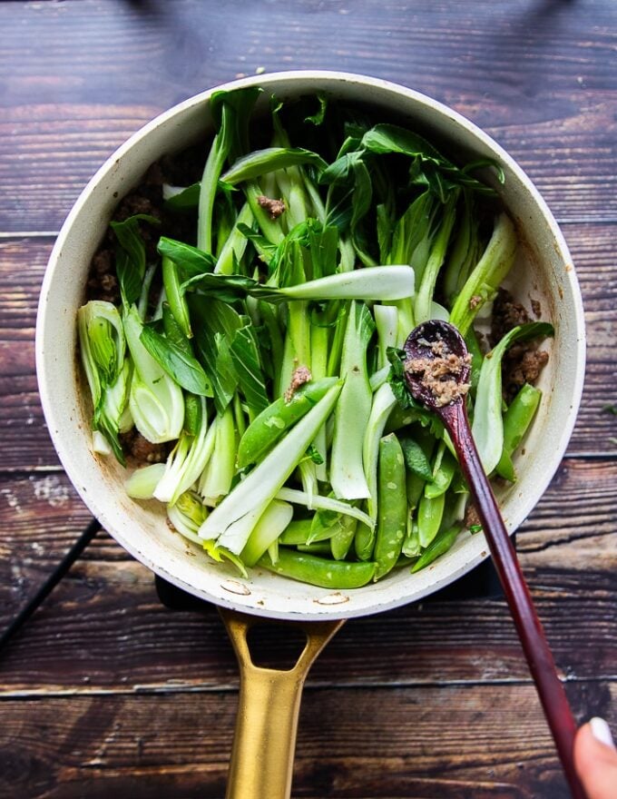 Optional, the bok choy is added to the skillet wit the ground beef
