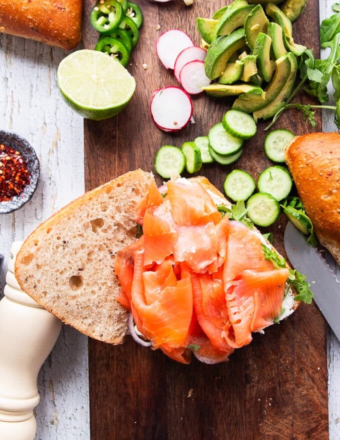 The smoked salmon piled over the bread and topping