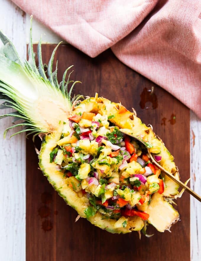 Optionally the pineapple salsa can be scooped back into the pineapple half shell for a beautiful presentation or served in a bowl 