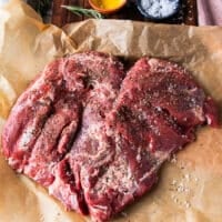 heavily salted and pepper boneless leg of lamb