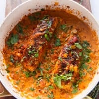 the chicken or halibut is retuned back to sauce to simmer and finish cooking if needed