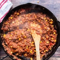 taco meat and sauce is now ready in a cast iron skillet