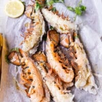 Seasoned lobster tails split and seasoned on both sides