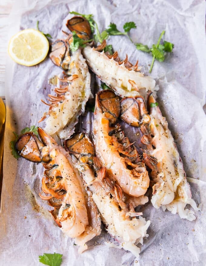 Seasoned lobster tails split and seasoned on both sides 