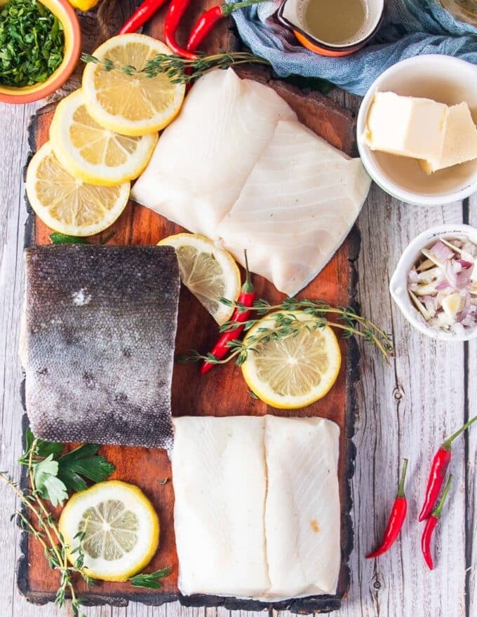 Ingredients to make lemon butter garlic sauce such as butter, lemon, garlic, water, seasoning 