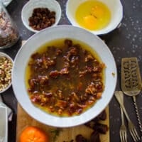 Date cake step by step beginning with dates in a bowl soaked in hot boiling water