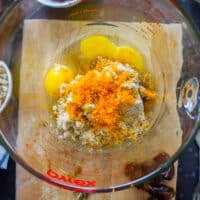 date cake wet ingredients in the bowl starting with eggs and sugar