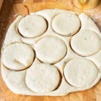 cut our circles of the biscuit dough on the surface