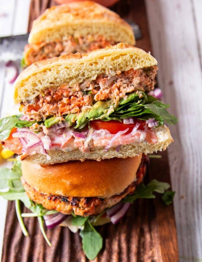 Healthy salmon burger recipe with avocado and lemon aioli sauce