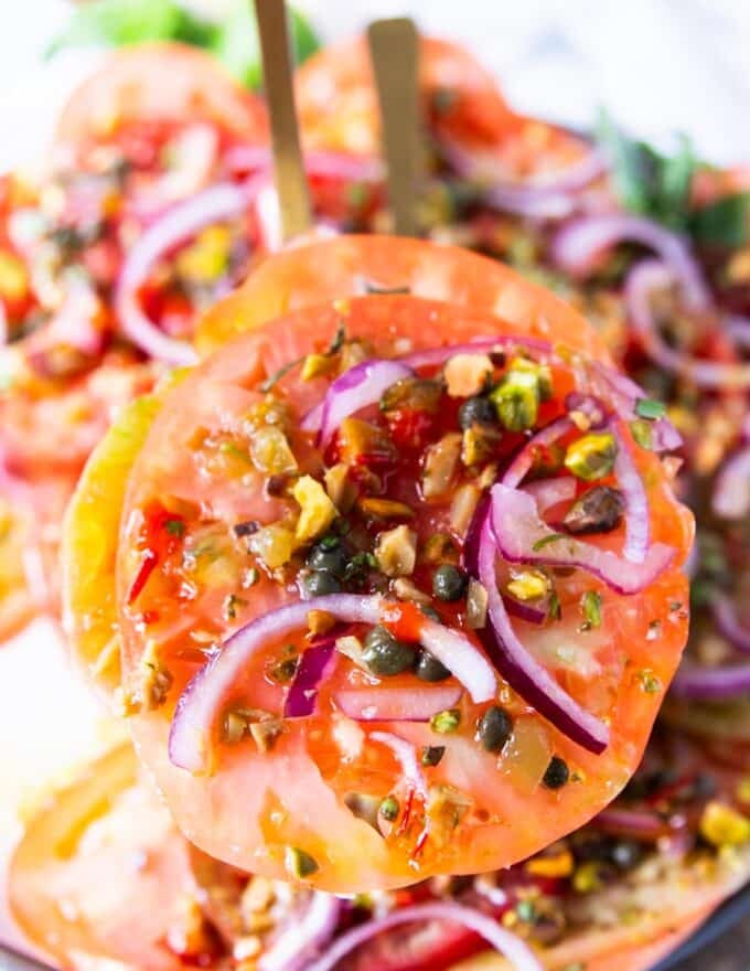 close up of one tomato carpaccio serving 