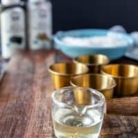 Close up of truffle oil in a glass cup