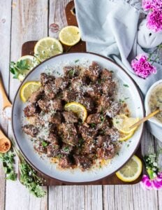 juicy air fryer steak bites with melted butter and parmesan