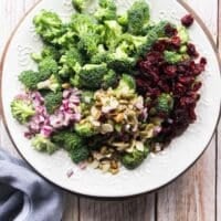 broccoli salad ingredients all added to the serving plate.