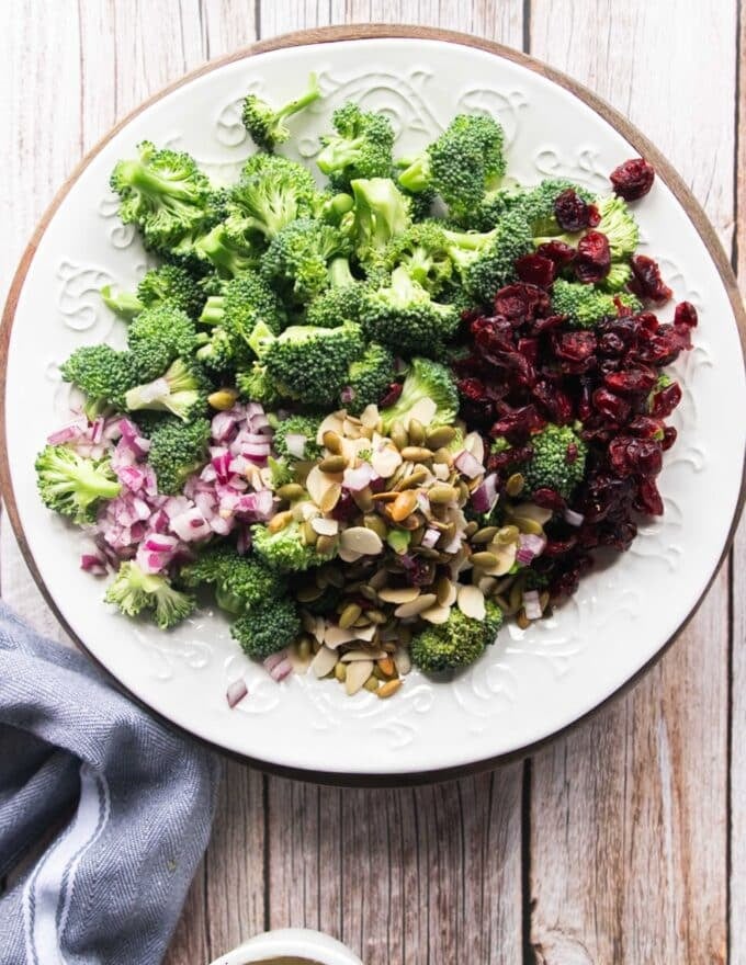 broccoli salad ingredients all added to the serving plate. 
