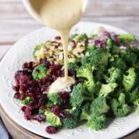 The creamy dressing poured over the broccoli salad ingredients