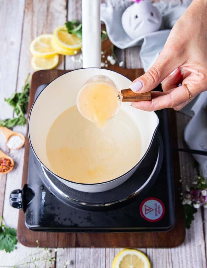 making the beurre blanc sauce, citrus jjuice is added now 