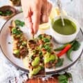 succulent halibut recipe drizzled with chermoula sauce