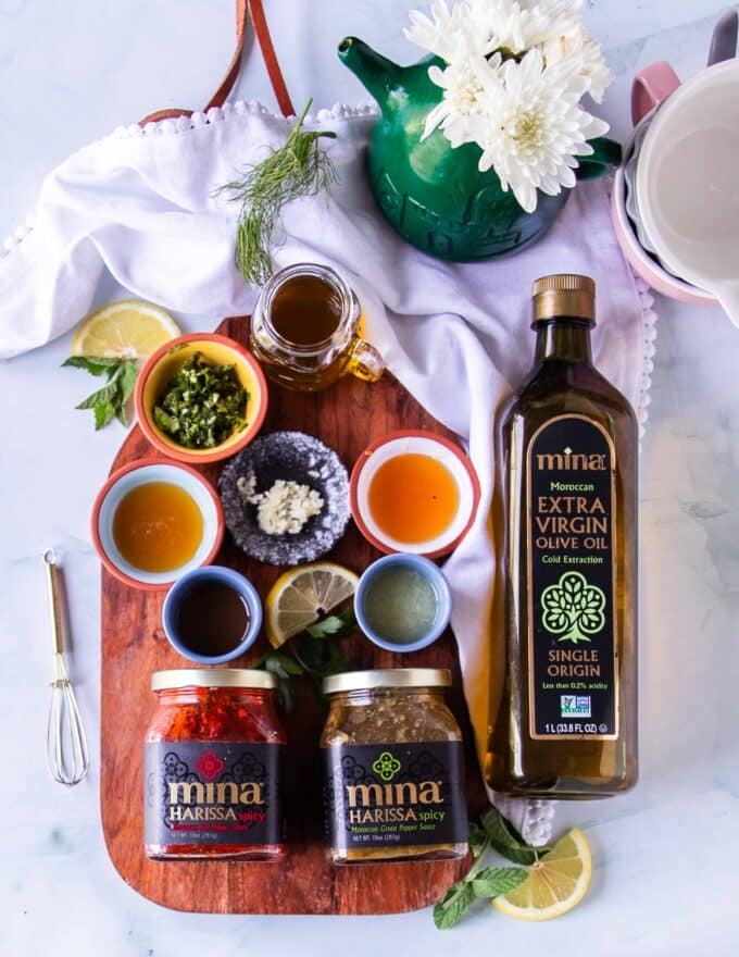 harissa vinaigrette Ingredients with harissa paste, olive oil, fresh garlic, honey, cilantro, some vinegar or lemon juice 