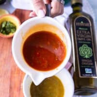 red harissa vinaigrette in a bowl