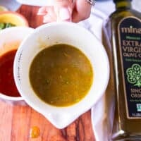 Green harissa vinaigrette in a bowl