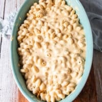 the final amount of pasta is added over the cheese