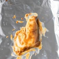 miso marinade over the chilean sea bass on foil lined sheet