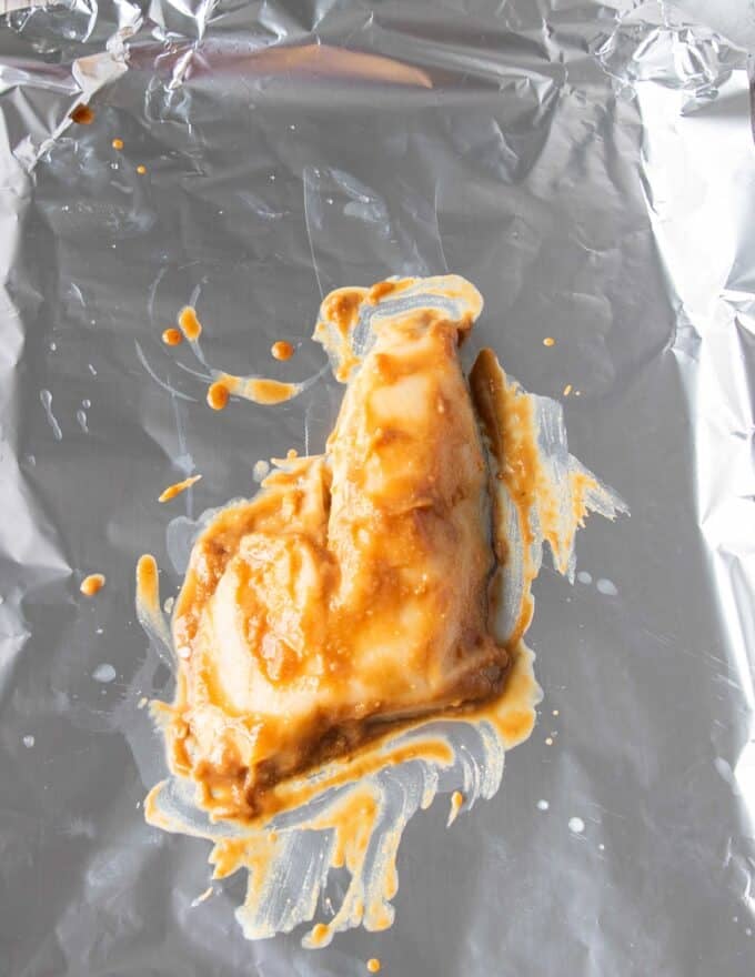 miso marinade over the chilean sea bass on foil lined sheet