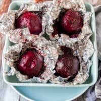 perfect roasted beets in a pan, cooled down and peeled from the foil to make beet carpaccio