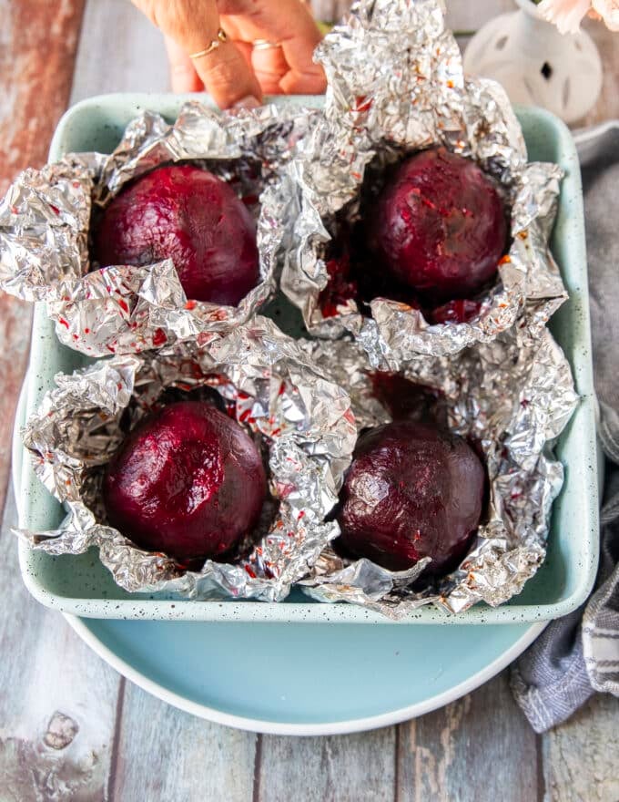 perfect roasted beets in a pan, cooled down and peeled from the foil to make beet carpaccio