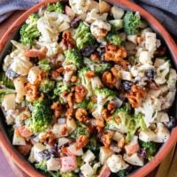 close up of a plate of broccoli cauliflower salad
