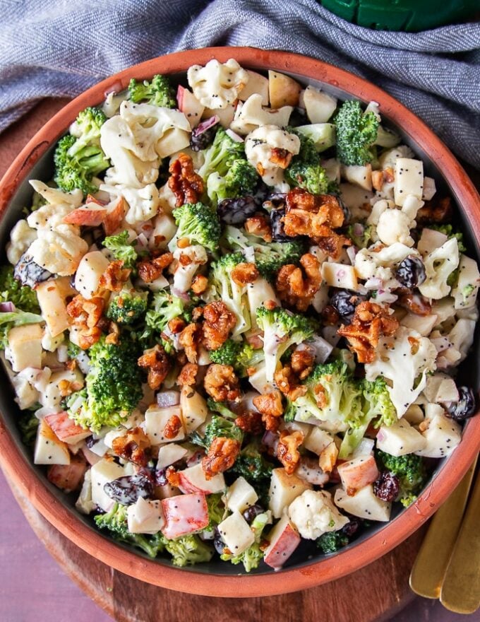 close up of a plate of broccoli cauliflower salad