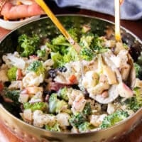 Tossing the salad with the dressing