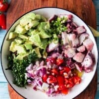 marinating the octopus to make octopus ceviche