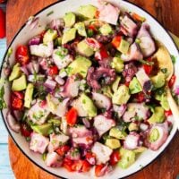 perfectly mixed octopus ceviche with chilies, lime and cilantro