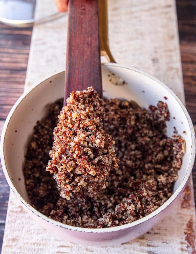 fluffing the quinoa pilaf