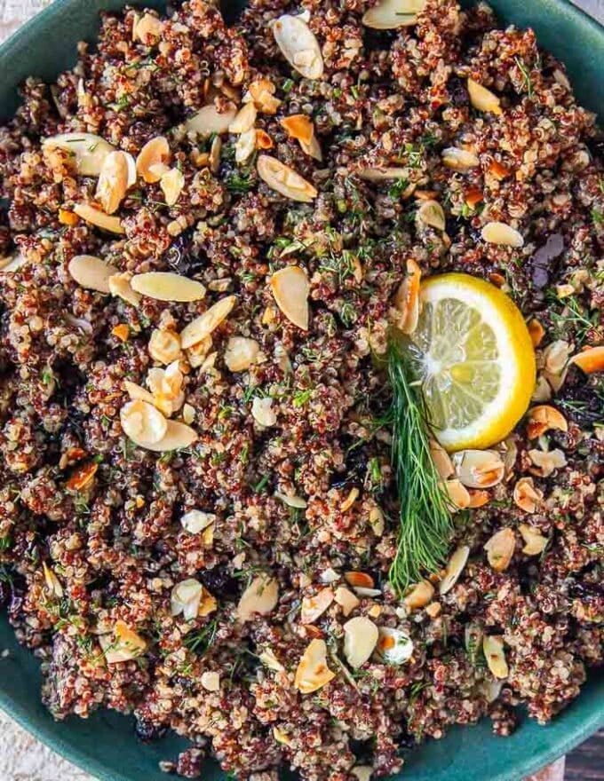 close up of a fluffy quinoa pilaf with nuts and cranberries