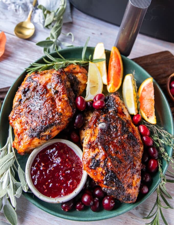 top view of air fryer turkey breast just out of the air fryer, looking golden and crisp