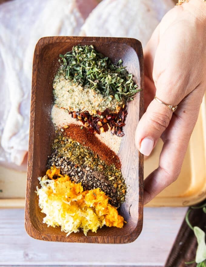 Seasoning and citrus zests in a bowl ready to flavor the turkey breast