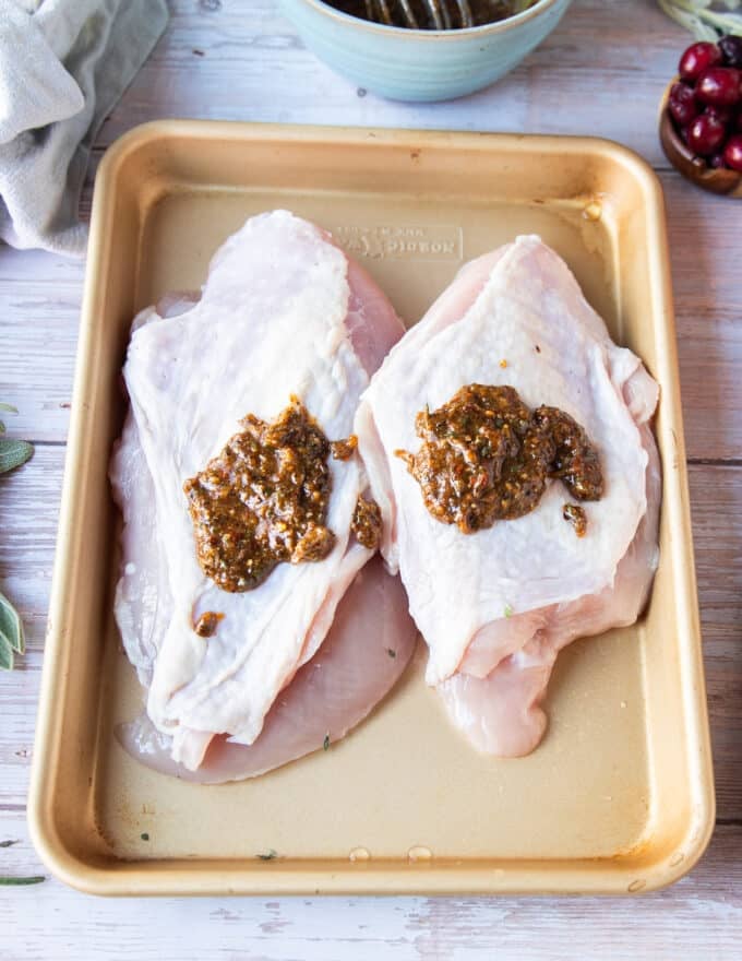 The butter mixture is added to the turkey breast 
