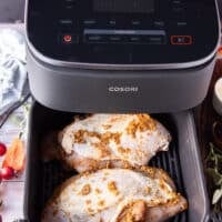 turkey breasts placed in the air fryer basket