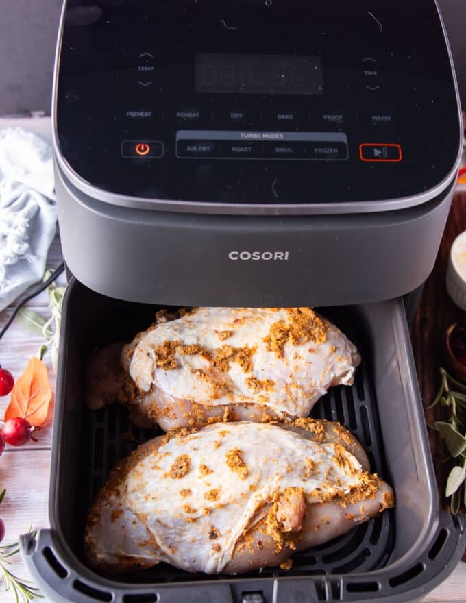 turkey breasts placed in the air fryer basket