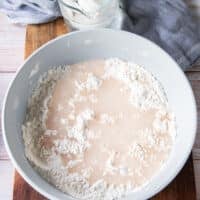 sparkling water added to the bowl of flour and cornstarch to make the batter