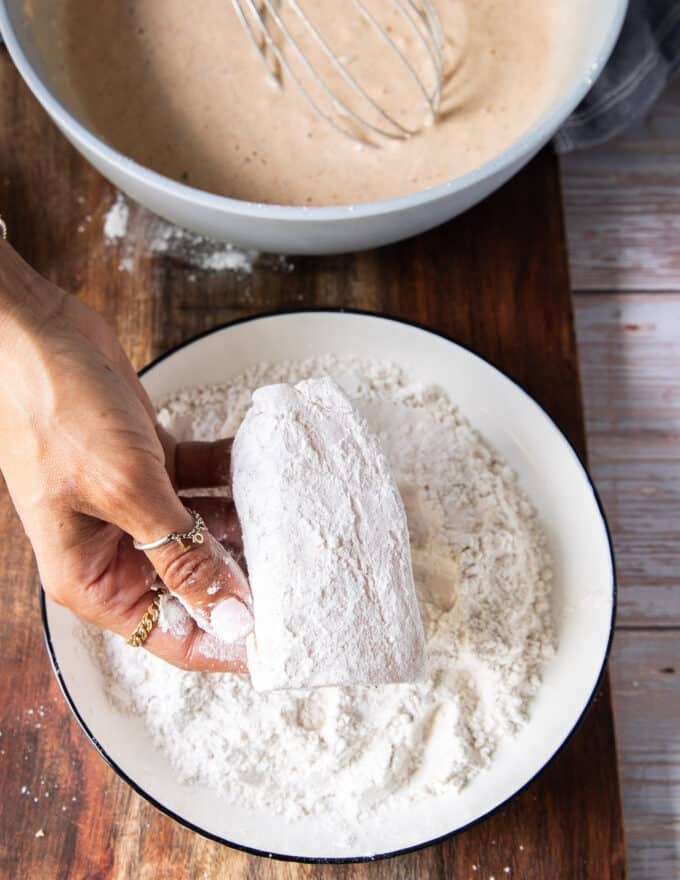 Fish dipped into a light coating of flour first