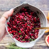 Pomegranate arils mixed with herbs and citrus and olive oil to drizzle over the lamb