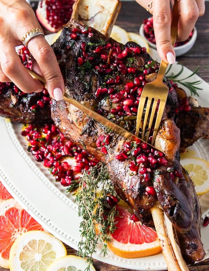 fork and knife cutting through the melt in your mouth tender lamb shoulder recipe 