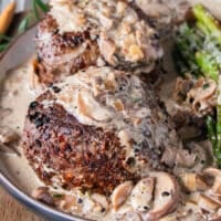 Perfectly cooked filet mignon drenched in creaky mushroom sauce for steak