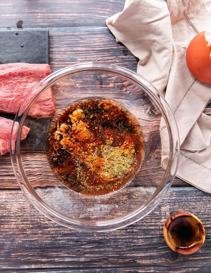 flank steak tacos marinade all added into a bowl