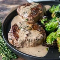 Steak cooked with a rich peppercorn steak sauce