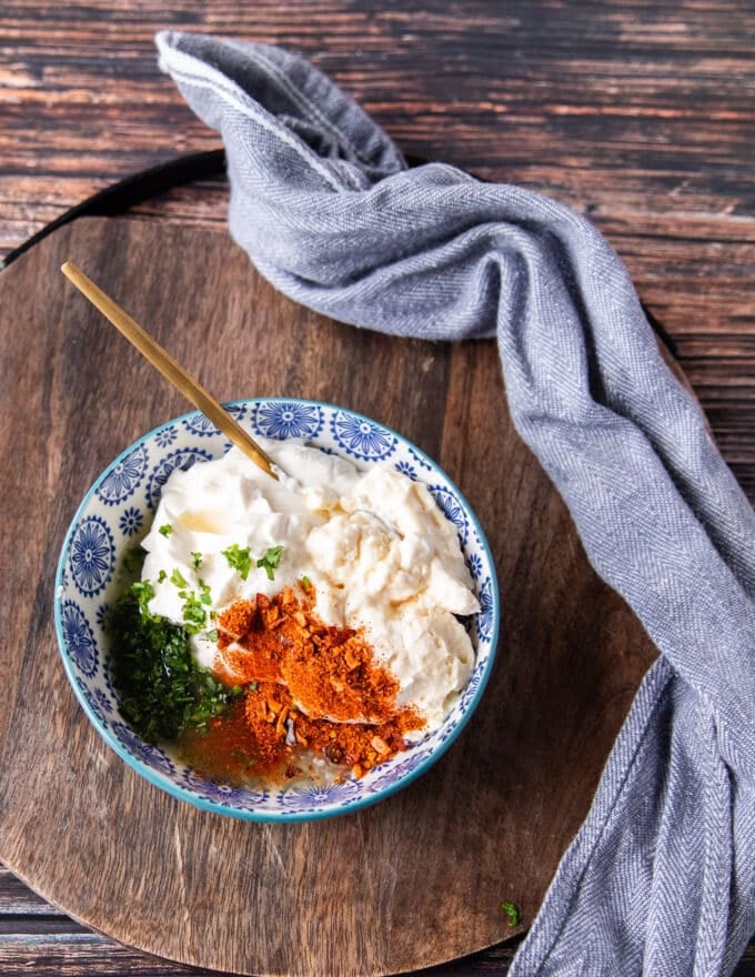 taco sauce ingredients all added into a bowl 