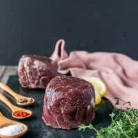 filet mignon raw close up showing the thick piece of center cut tenderloin